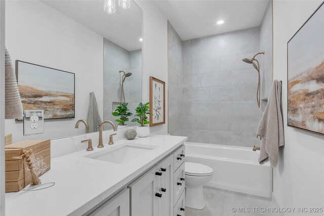 full bathroom with toilet, vanity, and tiled shower / bath combo