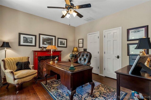 office featuring ceiling fan and dark hardwood / wood-style floors