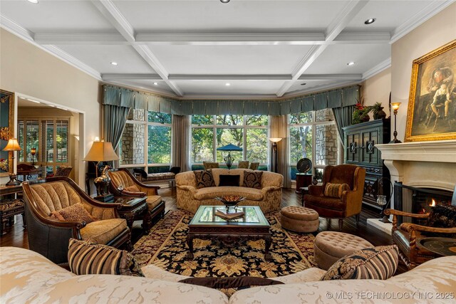 living room with beam ceiling, coffered ceiling, and hardwood / wood-style floors