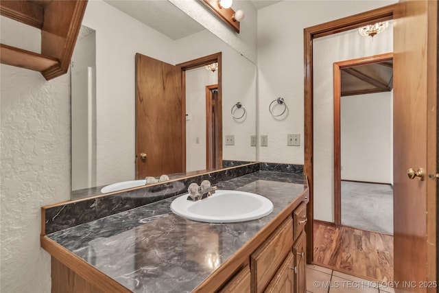 bathroom featuring tile patterned floors and vanity