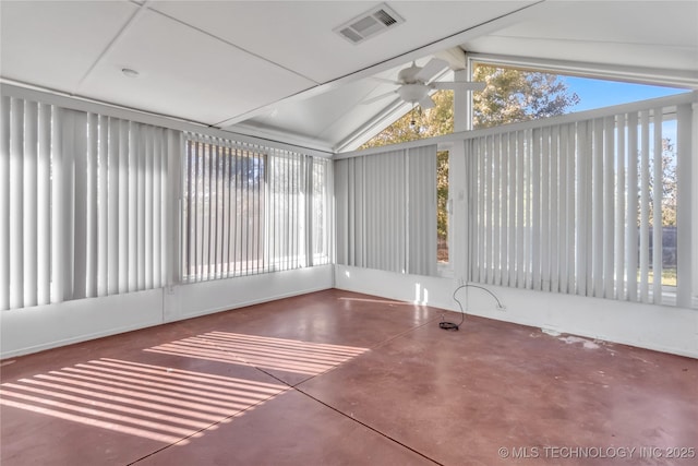 unfurnished sunroom with ceiling fan, a healthy amount of sunlight, and vaulted ceiling