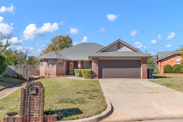 ranch-style house with a front yard and a garage