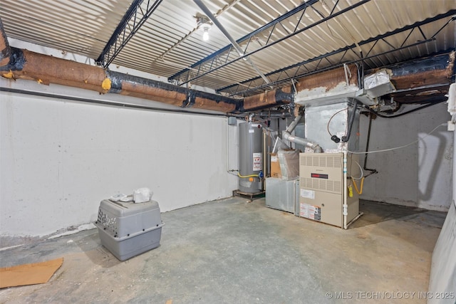 basement featuring gas water heater and heating unit