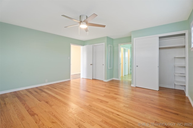 unfurnished bedroom featuring ceiling fan and light hardwood / wood-style floors