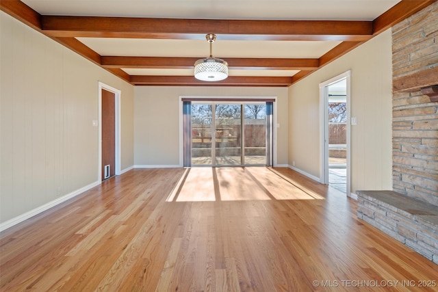 unfurnished living room with light wood-type flooring