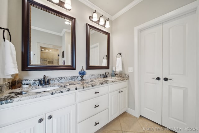 bathroom with tile patterned flooring, a shower, crown molding, and vanity