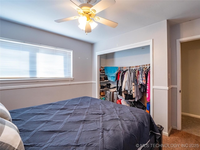 bedroom featuring carpet floors, ceiling fan, and a closet