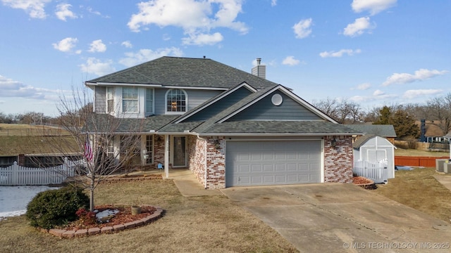 front of property featuring a garage and a front lawn