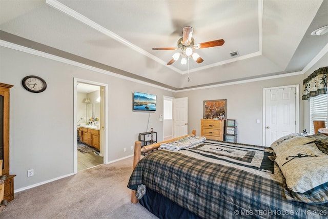 carpeted bedroom with ornamental molding, a raised ceiling, and ceiling fan