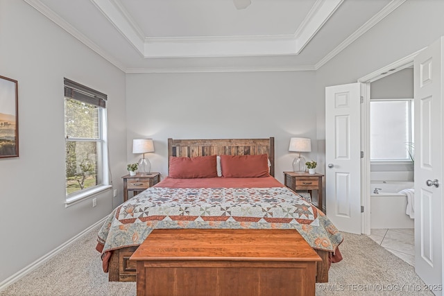 bedroom with ornamental molding, light carpet, and a tray ceiling