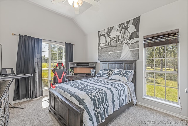 bedroom featuring ceiling fan, light carpet, and lofted ceiling