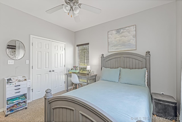 bedroom with carpet flooring, a closet, and ceiling fan