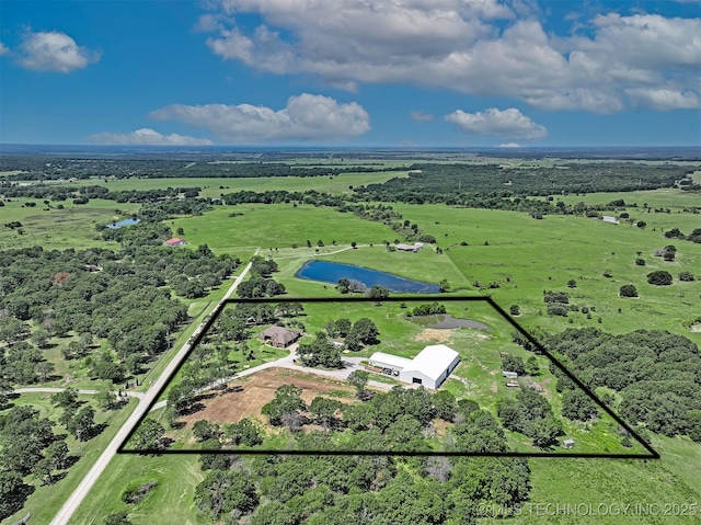 aerial view featuring a water view and a rural view