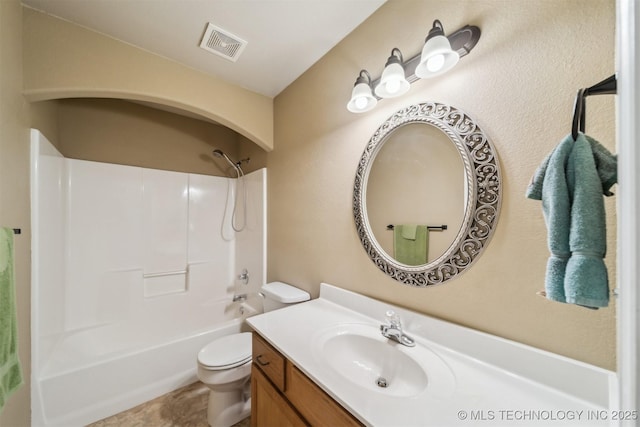 full bathroom with shower / washtub combination, vanity, and toilet