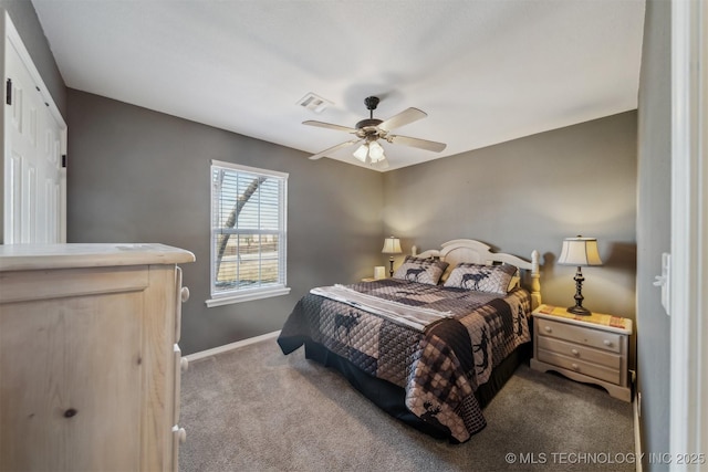 bedroom with a closet, ceiling fan, and light carpet