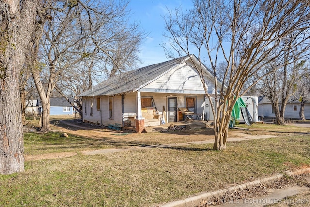 exterior space with a front yard