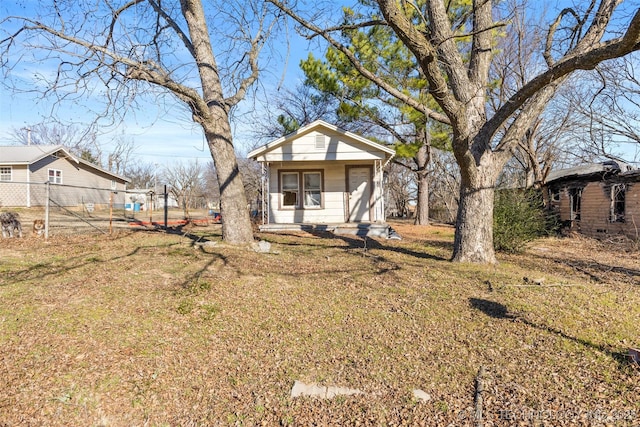 exterior space with a front lawn