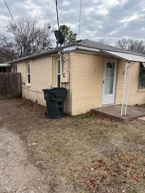 back of property featuring a patio