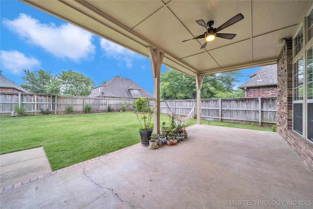 view of patio with ceiling fan