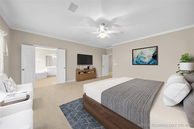 carpeted bedroom featuring ceiling fan, ensuite bathroom, and crown molding