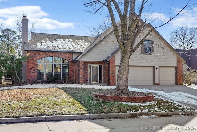 view of front of property with a garage