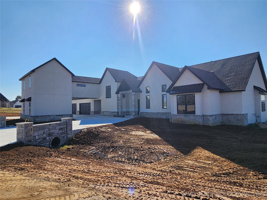 rear view of house featuring a patio area