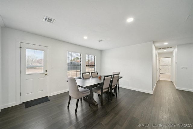 dining room featuring dark hardwood / wood-style floors