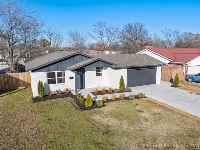 single story home with a front lawn and a garage