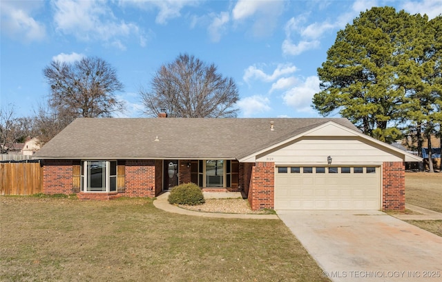 ranch-style house with a garage and a front lawn