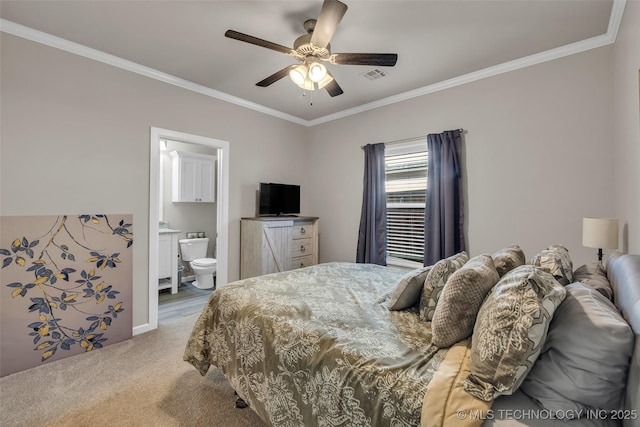 bedroom featuring connected bathroom, carpet floors, ceiling fan, and crown molding