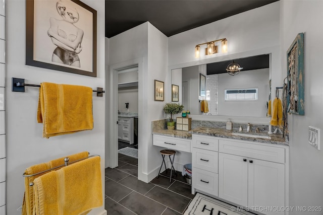 bathroom with vanity and tile patterned floors