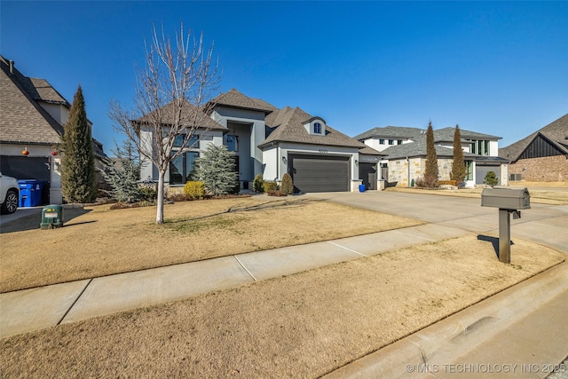 view of front of property with a garage