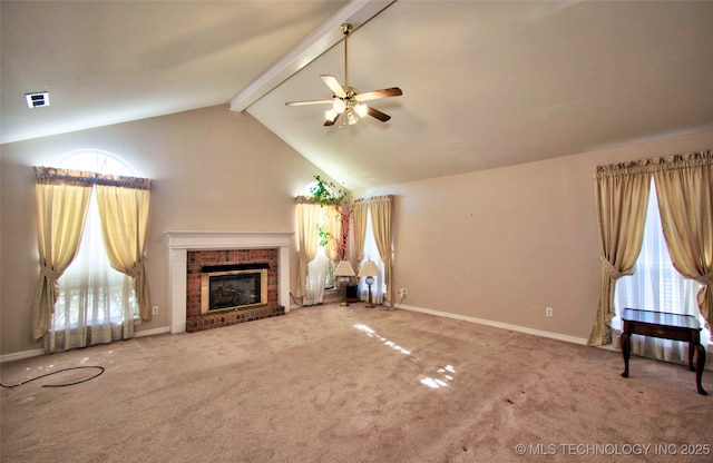 unfurnished living room with ceiling fan, a brick fireplace, carpet floors, high vaulted ceiling, and beam ceiling