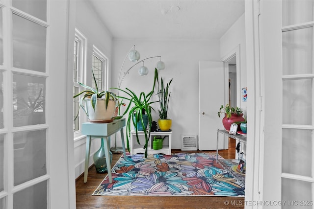 interior space with hardwood / wood-style flooring