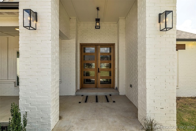 property entrance featuring french doors