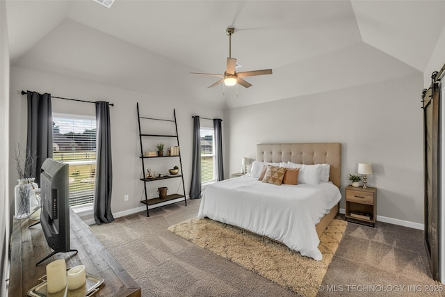 carpeted bedroom featuring multiple windows, ceiling fan, vaulted ceiling, and a barn door