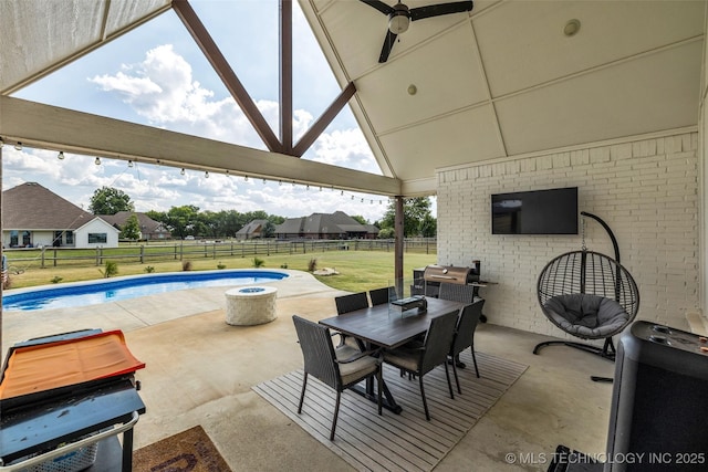 view of patio / terrace featuring a fenced in pool