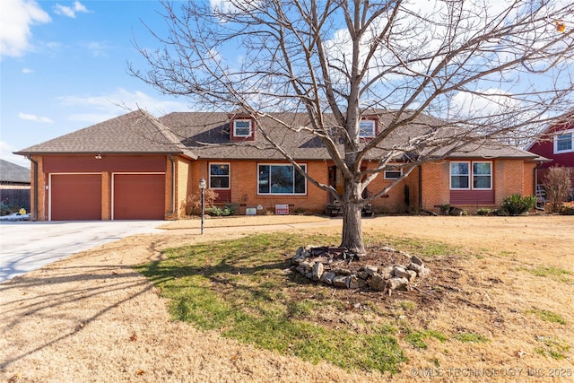 ranch-style house featuring a garage