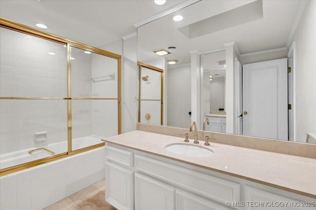 bathroom featuring bath / shower combo with glass door, recessed lighting, ornamental molding, vanity, and tile patterned floors