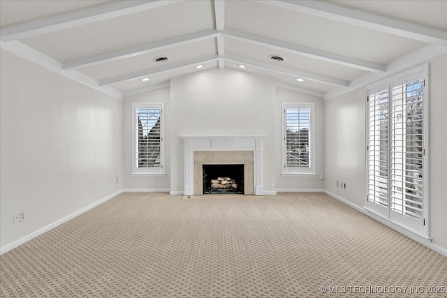 unfurnished living room featuring carpet, visible vents, and lofted ceiling with beams