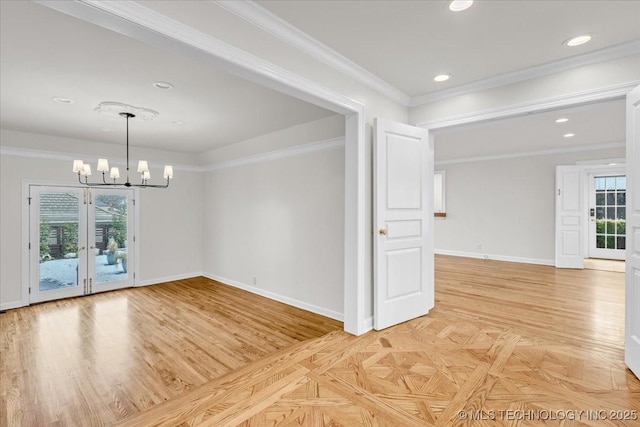 empty room featuring baseboards, recessed lighting, a notable chandelier, and crown molding