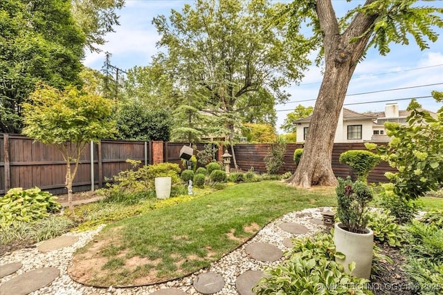 view of yard featuring fence