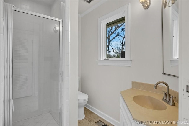 full bathroom featuring a stall shower, baseboards, visible vents, toilet, and vanity