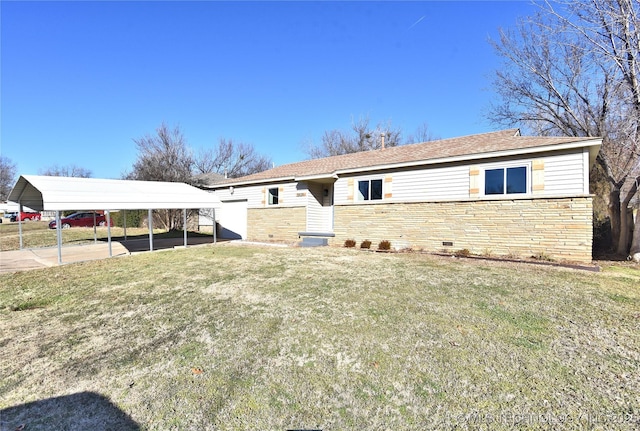 ranch-style house featuring a front yard and a carport