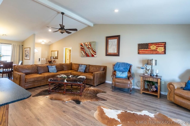 living room with vaulted ceiling with beams, wood-type flooring, and ceiling fan