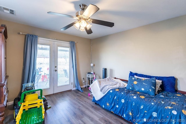 bedroom with hardwood / wood-style flooring, ceiling fan, french doors, and access to outside