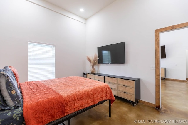 bedroom with a high ceiling