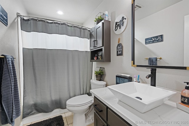 full bathroom with toilet, tile patterned flooring, shower / bathtub combination with curtain, and vanity