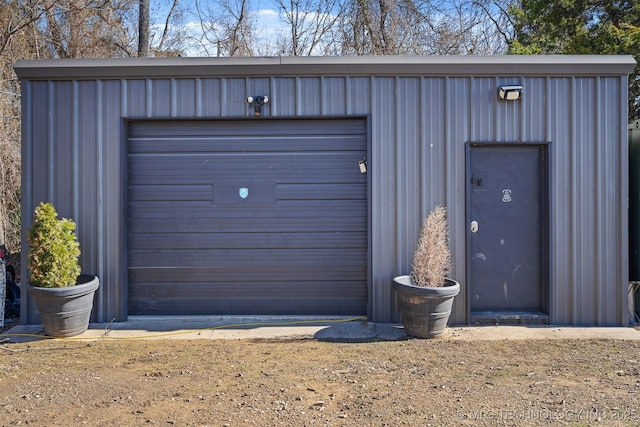 view of outbuilding featuring a garage