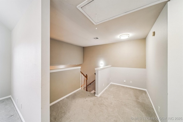 interior space featuring light colored carpet